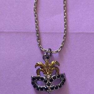 Elegant Gold and Silver Mask Pendant Necklace